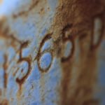 photo of numbers stamped in metal from an old tractor